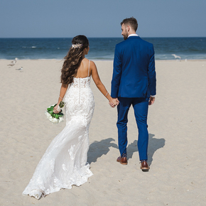 Breathtaking Wedding Photos From Our Beach Wedding Photographers at Windows on the Water AGJZ-13